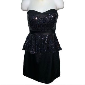 Black sequined strapless peplum mini